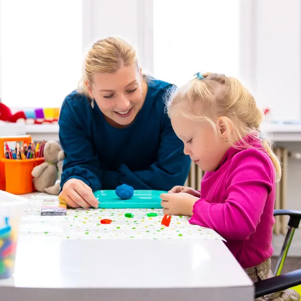An Occupational Therapist with a patient