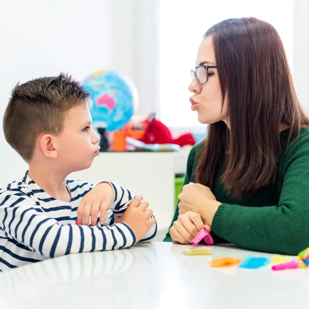 A Speech Therapist with a patient